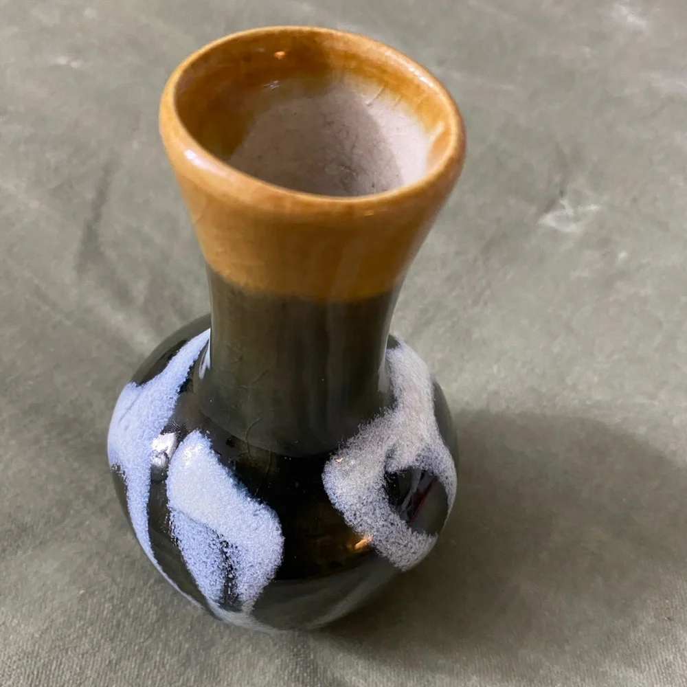 Handcrafted Ceramic Vase with Earthy Tones. UBV